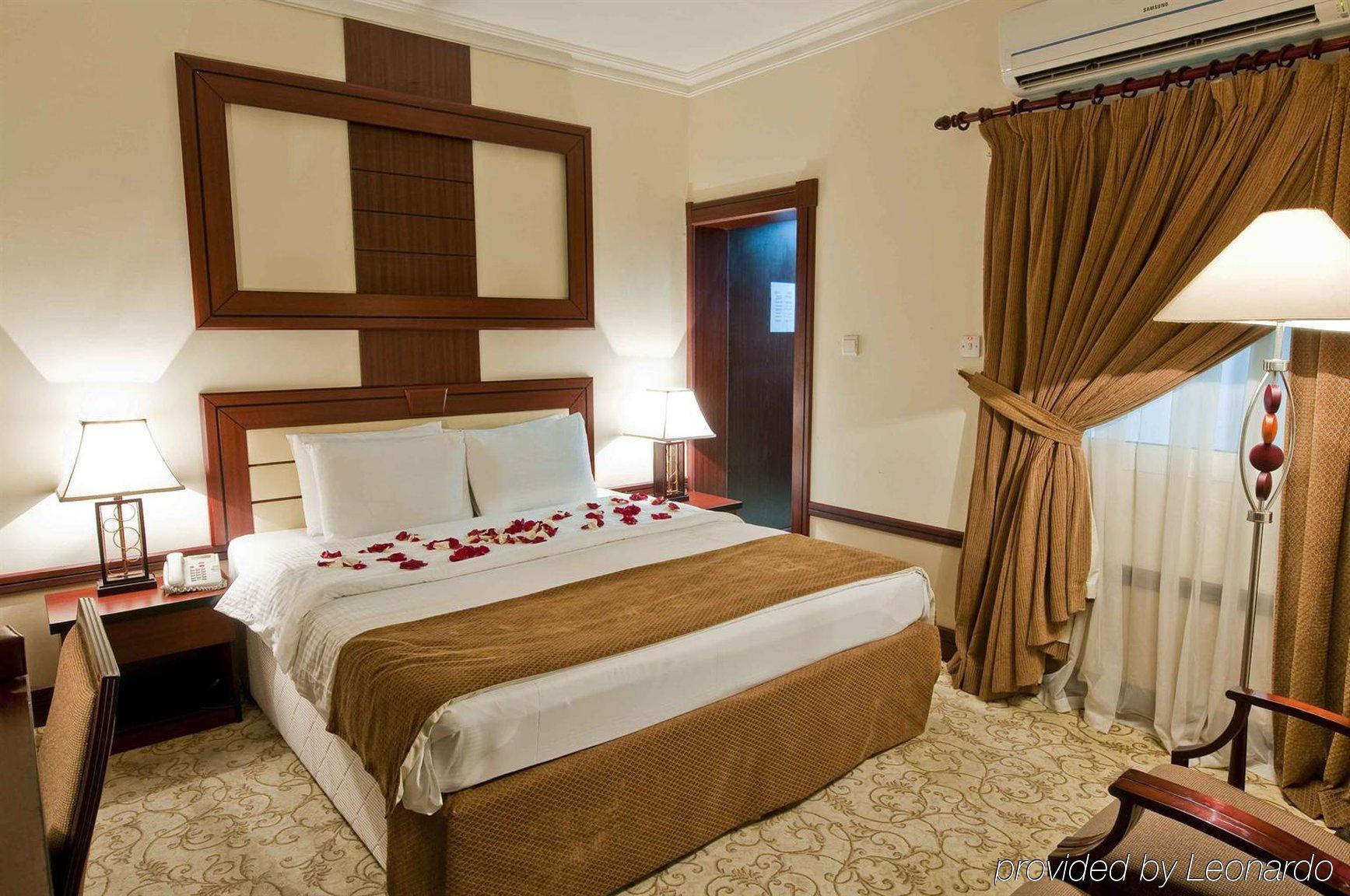 La Villa Palace Hotel Doha Kamer foto